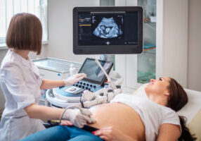 Pregnant,Woman,On,Utltrasonographic,Examination,At,Hospital Pregnant,Woman,On,Utltrasonographic,Examination,At,Hospital